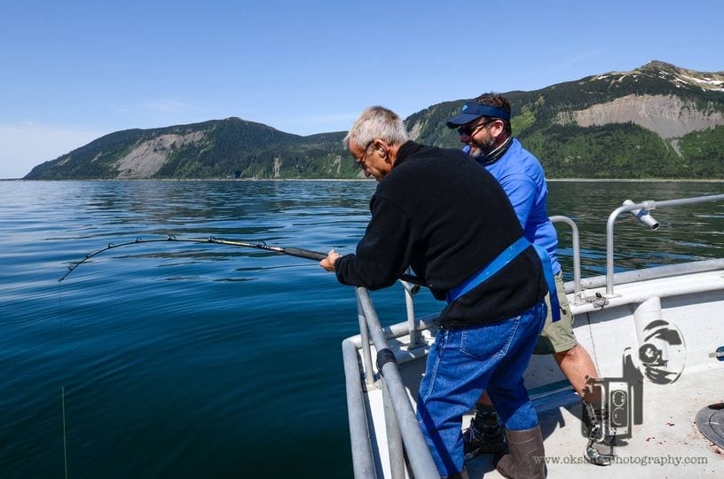 This is Archie Leckwald hooked up with a 100 pound halibut f...
