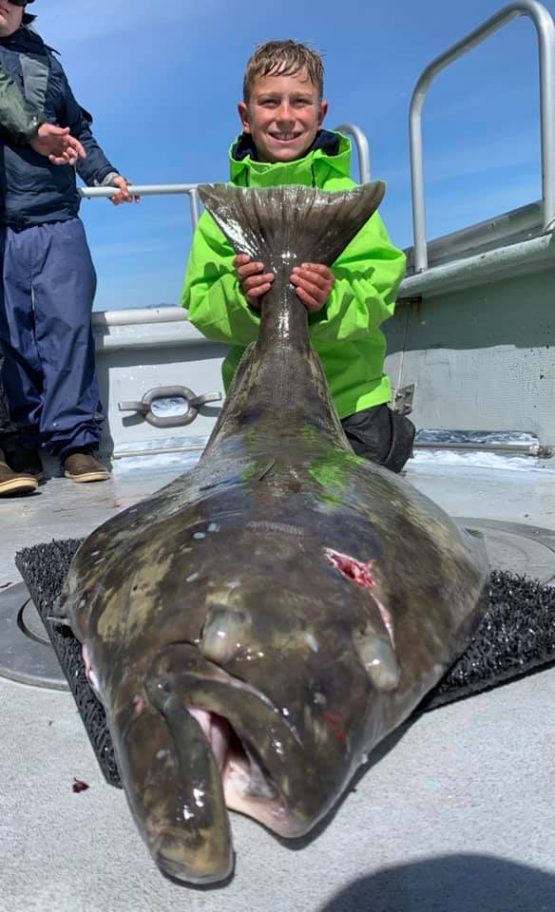 Colby with a fish bigger than him, escaping the Arizona heat...